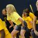 Logan Elementary School second grade teacher Kristi Krile smiles as she dances with fellow teachers in a surprise flash mob performance during a year-end assembly on Friday morning. Melanie Maxwell I AnnArbor.com